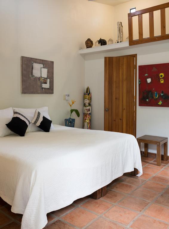 Habitación con vistas al jardín.